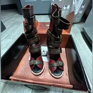 Worn one time.  Size 8.5.. Paid $325 for them.  Asking $275 or best offer.